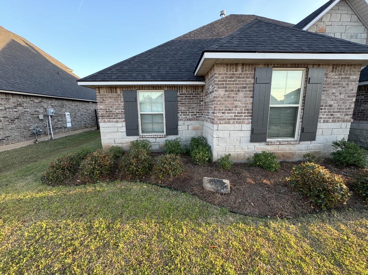 Shrub trimming & bed cleanup — after